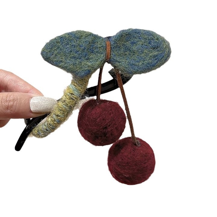 This autumn and winter retro cherry twist clip is a unique and high-end women's fashion hair clip. The back of the head is a shark clip that shows a lot of hair Item Picture