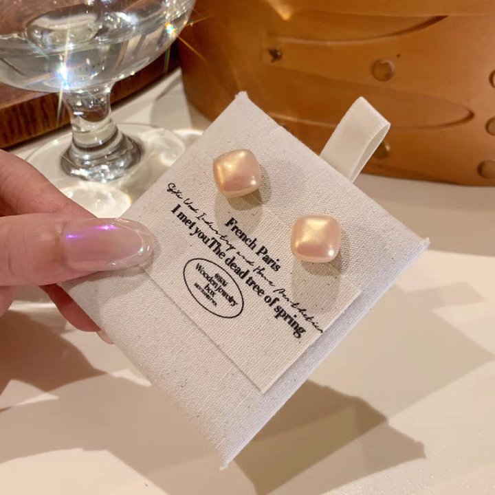 Zirconium rose flower earrings with a light luxury and high-end feel, stud earrings, a 2026 bestseller for women, are versatile and niche earrings for summer commutes undefined