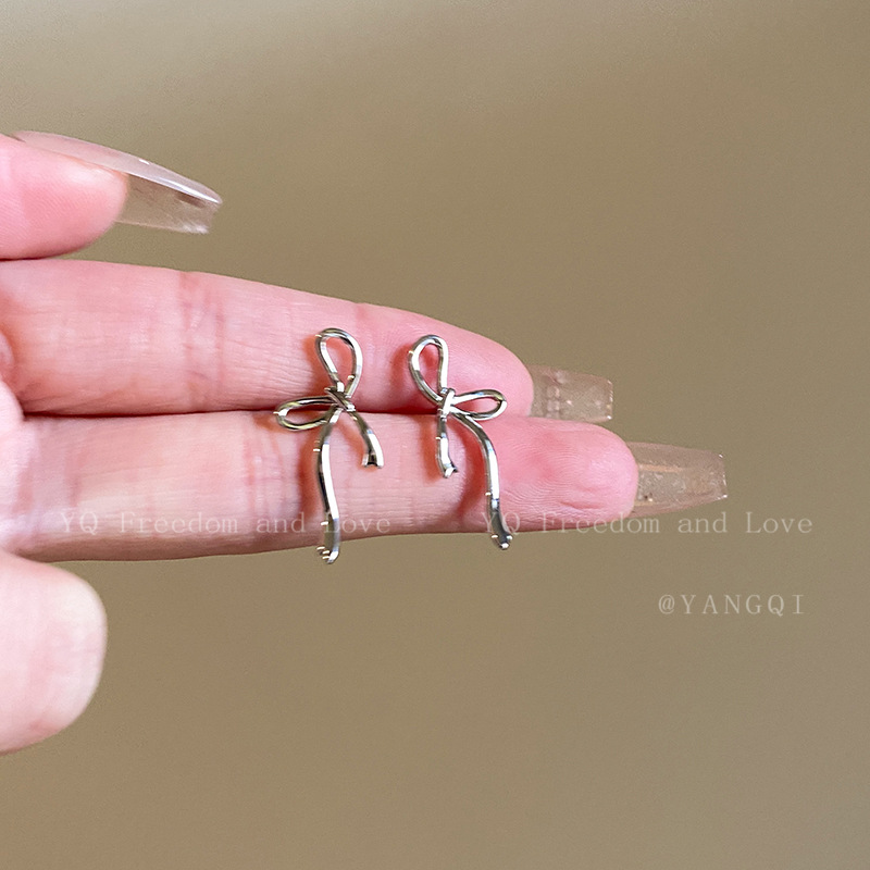 Simple and cold style tie bow stud earrings for women, sweet and elegant, versatile ins earrings 2026 new style earrings undefined