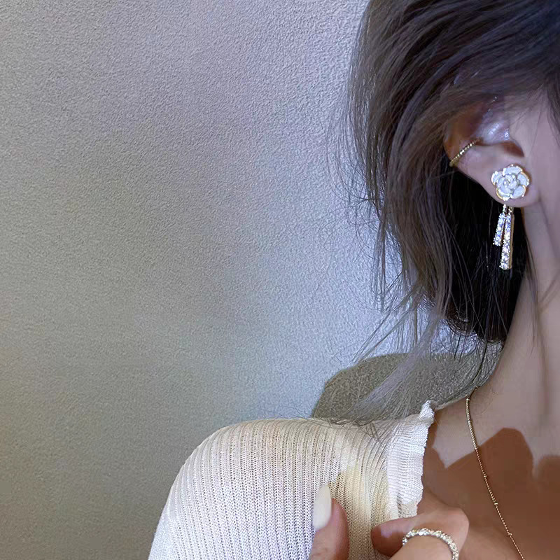 Zirconium rose flower earrings with a light luxury and high-end feel, stud earrings, a 2026 bestseller for women, are versatile and niche earrings for summer commutes undefined