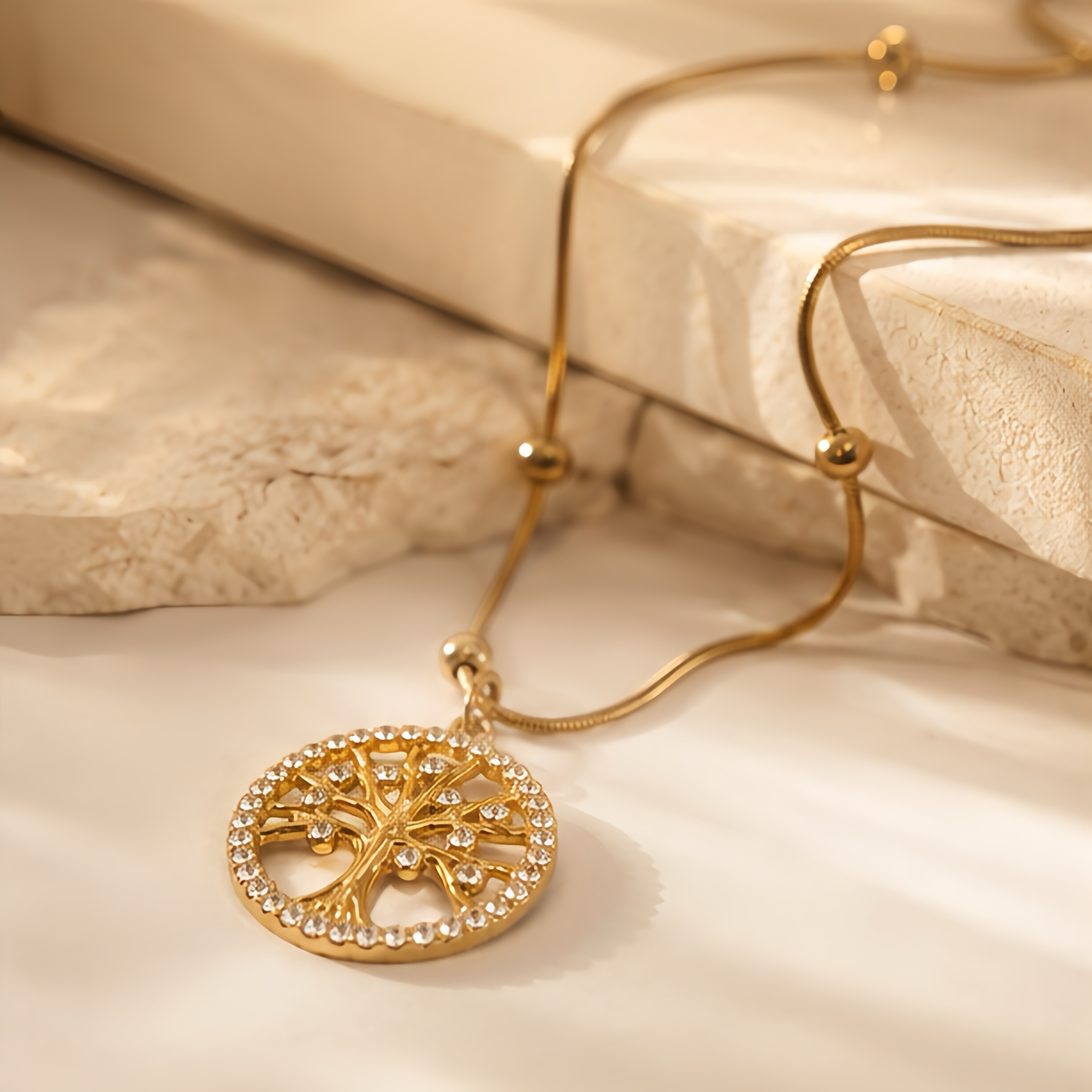 This diamond-encrusted retro life tree hollowed-out necklace does not fade and exudes a high-end, niche European and American style with a light luxury atmosphere for ladies. It features a snake bone chain details Picture