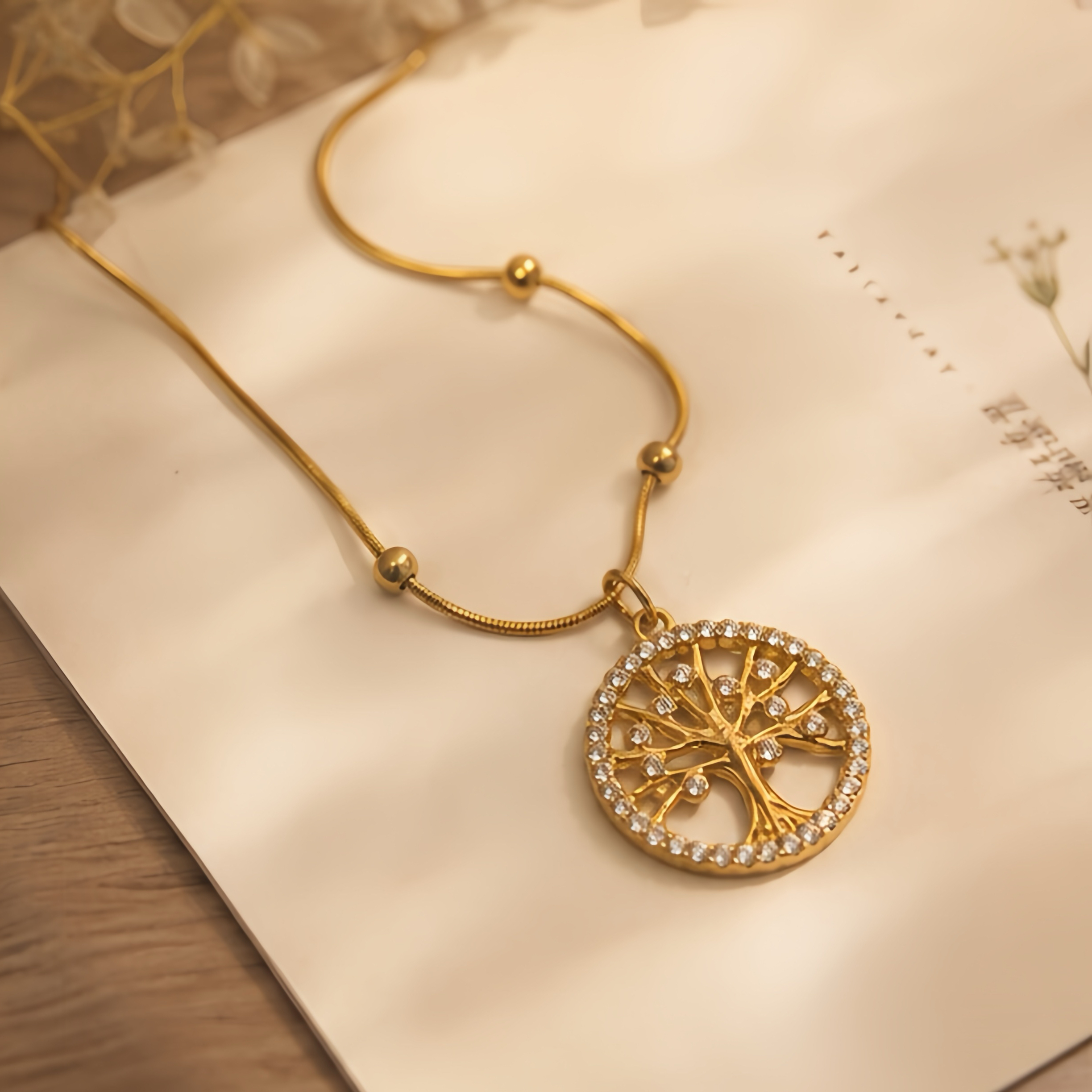 This diamond-encrusted retro life tree hollowed-out necklace does not fade and exudes a high-end, niche European and American style with a light luxury atmosphere for ladies. It features a snake bone chain Specification image