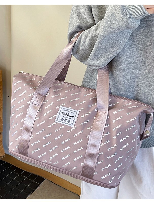 This foldable and portable travel bag has a large capacity and can be used to fit a suitcase. It is a convenient travel bag for leisure, fitness and yoga storage detail image 2