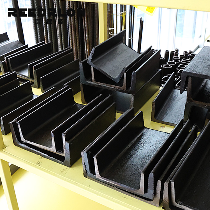 Black U-shaped channel steel products are specially designed for steel structures and used on yellow shelves for display details Picture