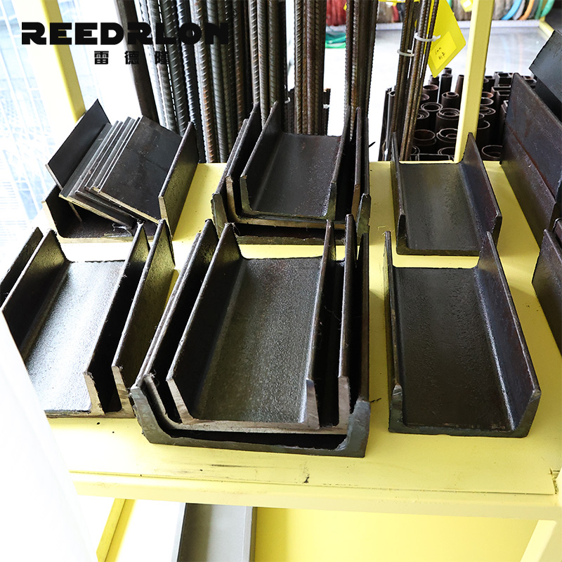 Black U-shaped channel steel products are specially designed for steel structures and used on yellow shelves for display Application Scenario
