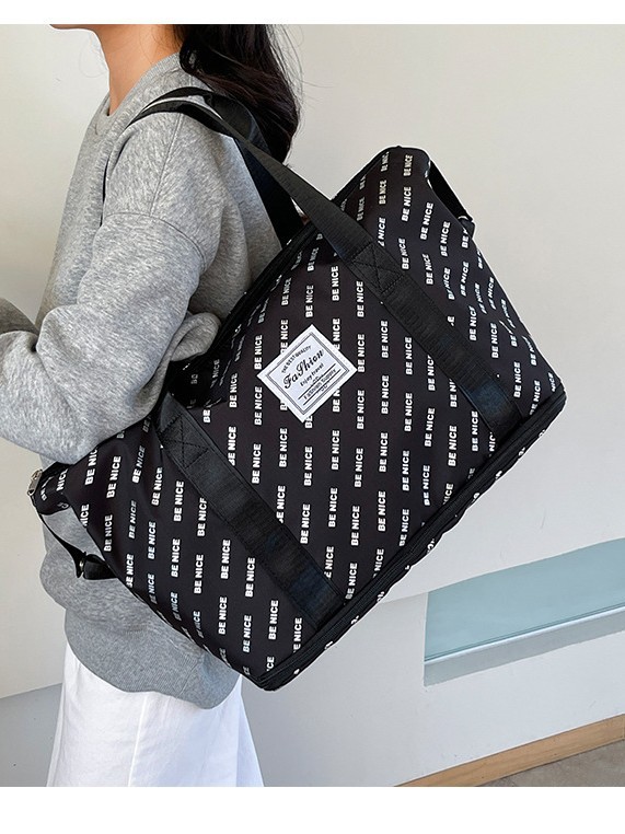 This foldable and portable travel bag has a large capacity and can be used to fit a suitcase. It is a convenient travel bag for leisure, fitness and yoga storage detail image 1