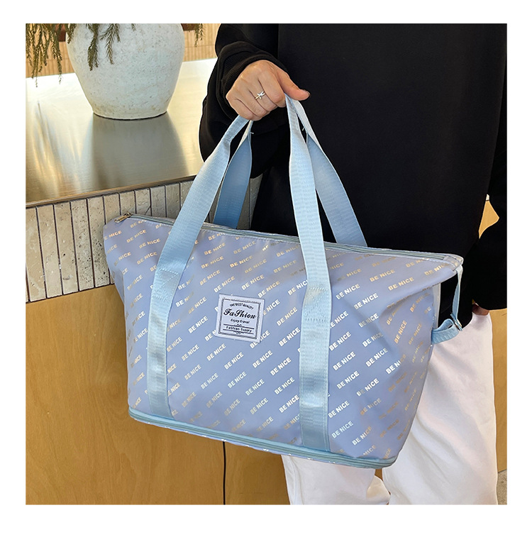 This foldable and portable travel bag has a large capacity and can be used to fit a suitcase. It is a convenient travel bag for leisure, fitness and yoga storage detail image 6