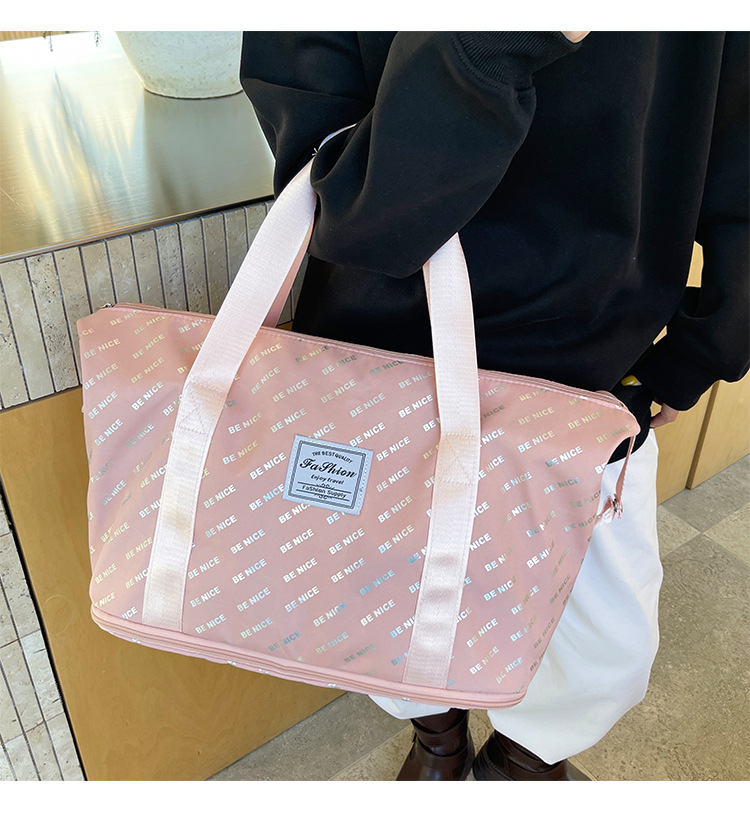 This foldable and portable travel bag has a large capacity and can be used to fit a suitcase. It is a convenient travel bag for leisure, fitness and yoga storage detail image 7