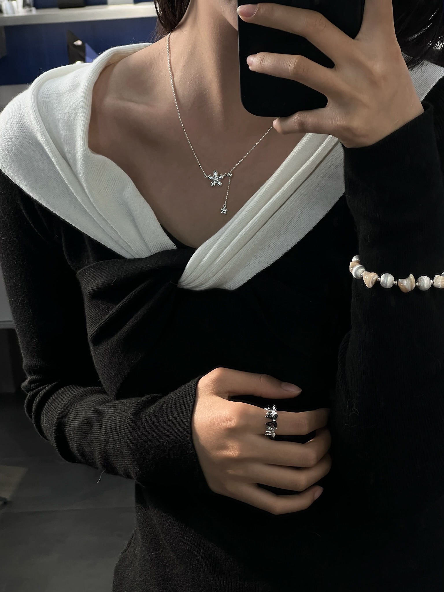 The S925 sterling silver necklace features a single flower and a pendant, each piece exquisitely beautiful