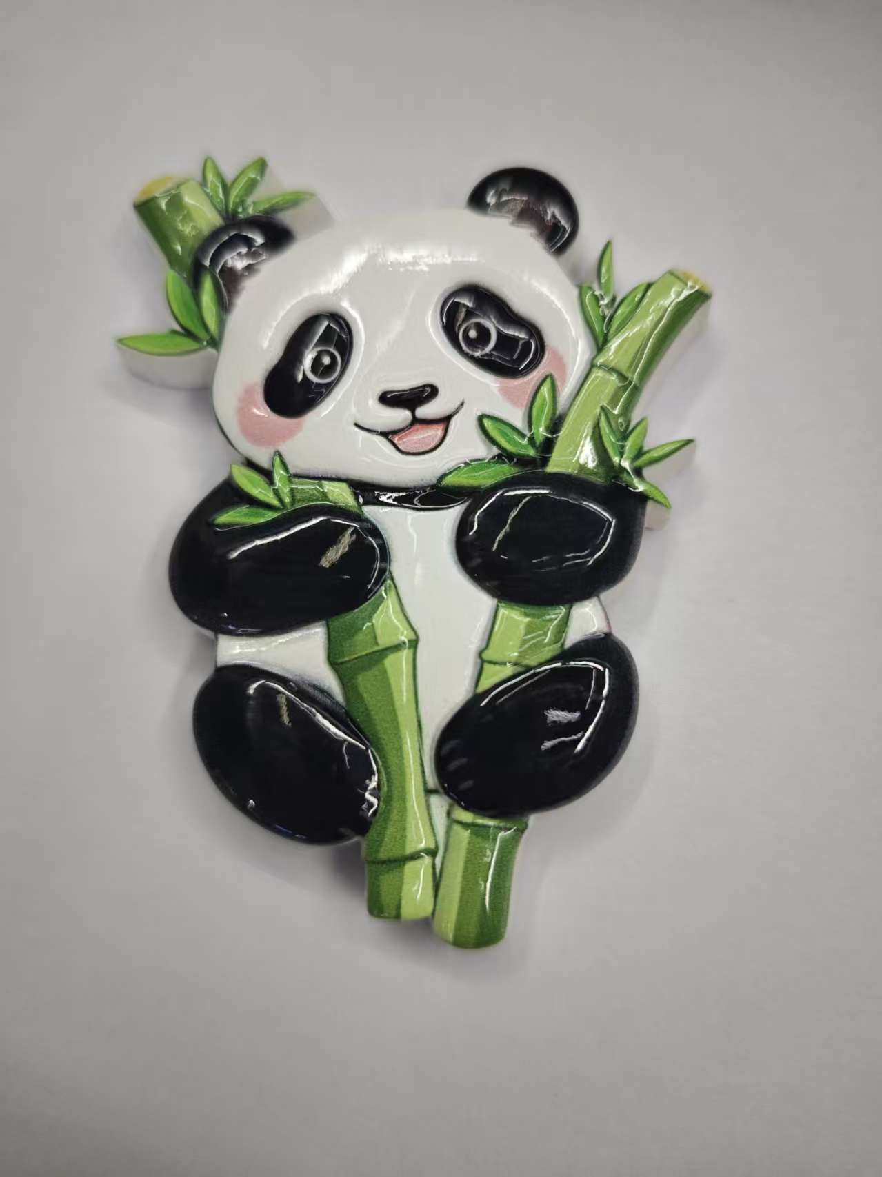 "National trend panda eats bamboo fridge magnets.