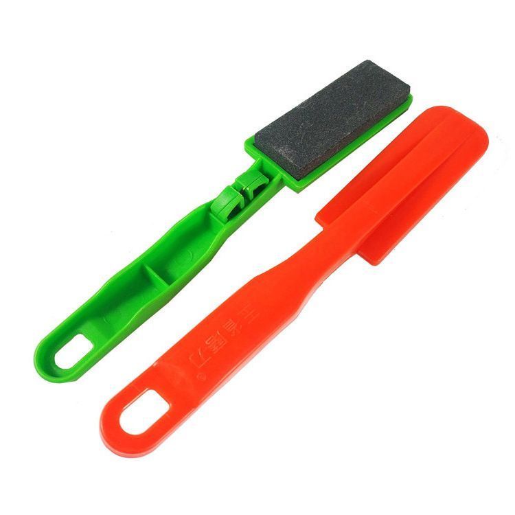 Products at the street stall exhibition and sales fair: Large knife sharpener brushes with cutting edges, knife sharpeners, and whetstones