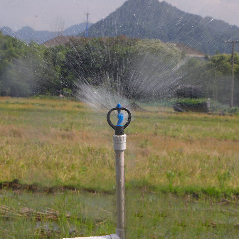 Blue impeller butterfly-shaped rotating nozzle 360° rain-like spray agricultural irrigation nozzle, orchard greenhouse cooling water sprinkler Application Scenario