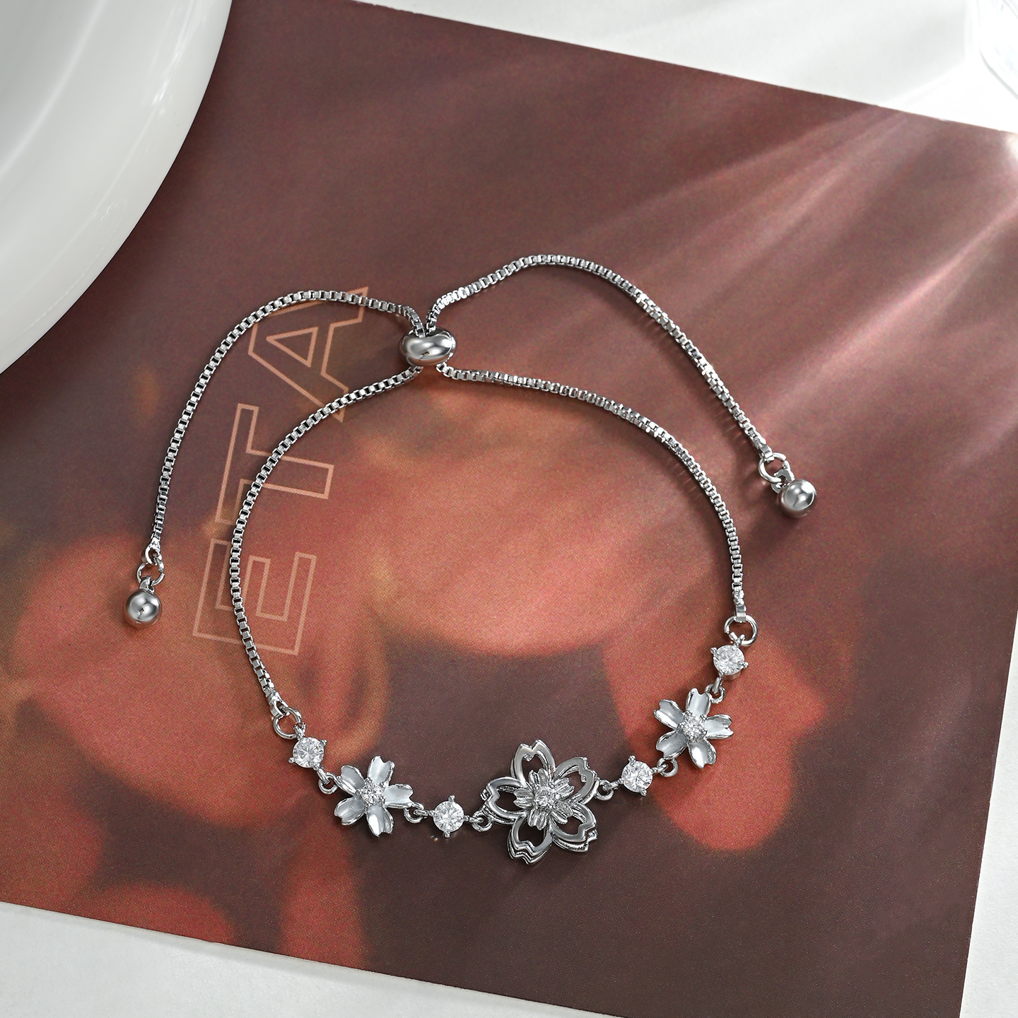 Wholesale of three-dimensional flower diamond snake bone bracelet, cherry blossom falling petal fine chain bracelet, fairy-like girl bracelet accessories pic 3