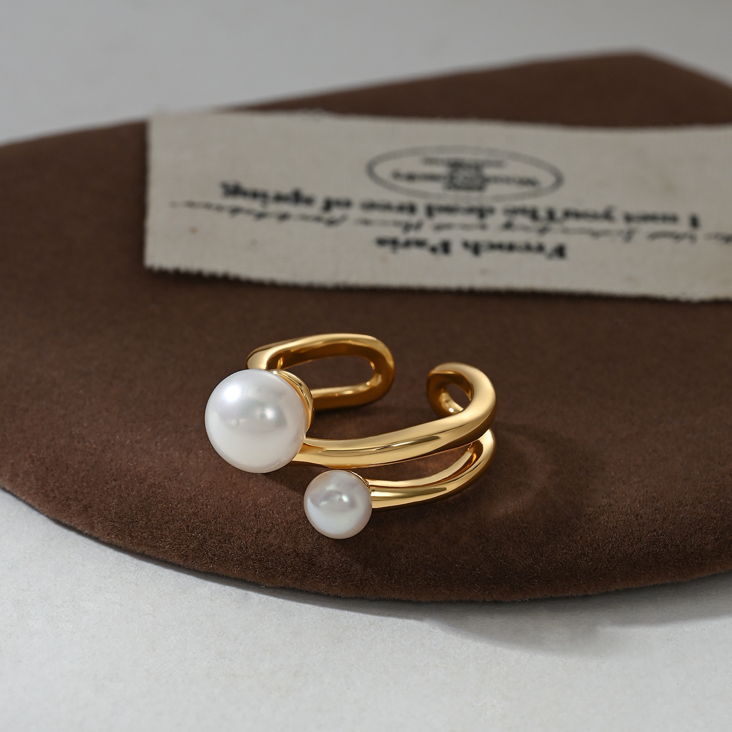 A golden double-layer large and small double pearl open ring for women, a French retro light luxury ring Application Scenario