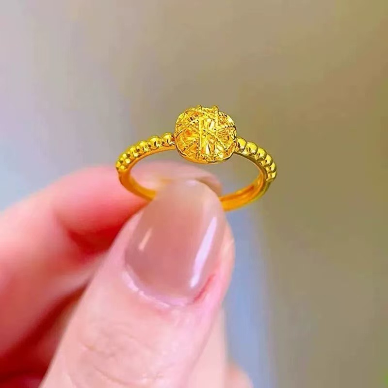 A unique, simple, luxurious and individualistic golden circular ball design ring details Picture