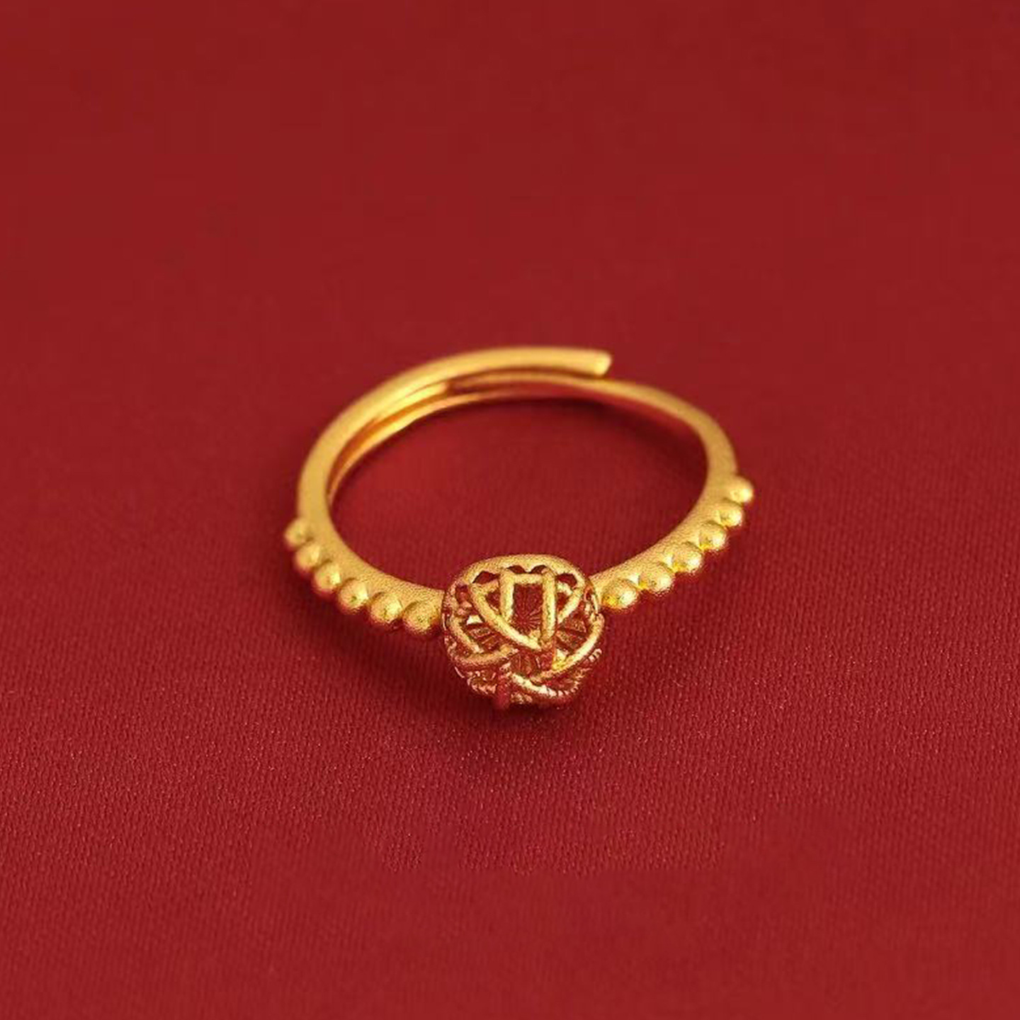A unique, simple, luxurious and individualistic golden circular ball design ring Specification image