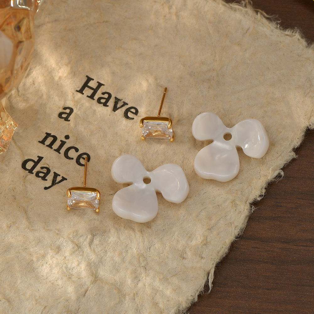 Milky white petal square shiny stone stud earrings, gentle and three-dimensional flower earrings for women's commuting details Picture