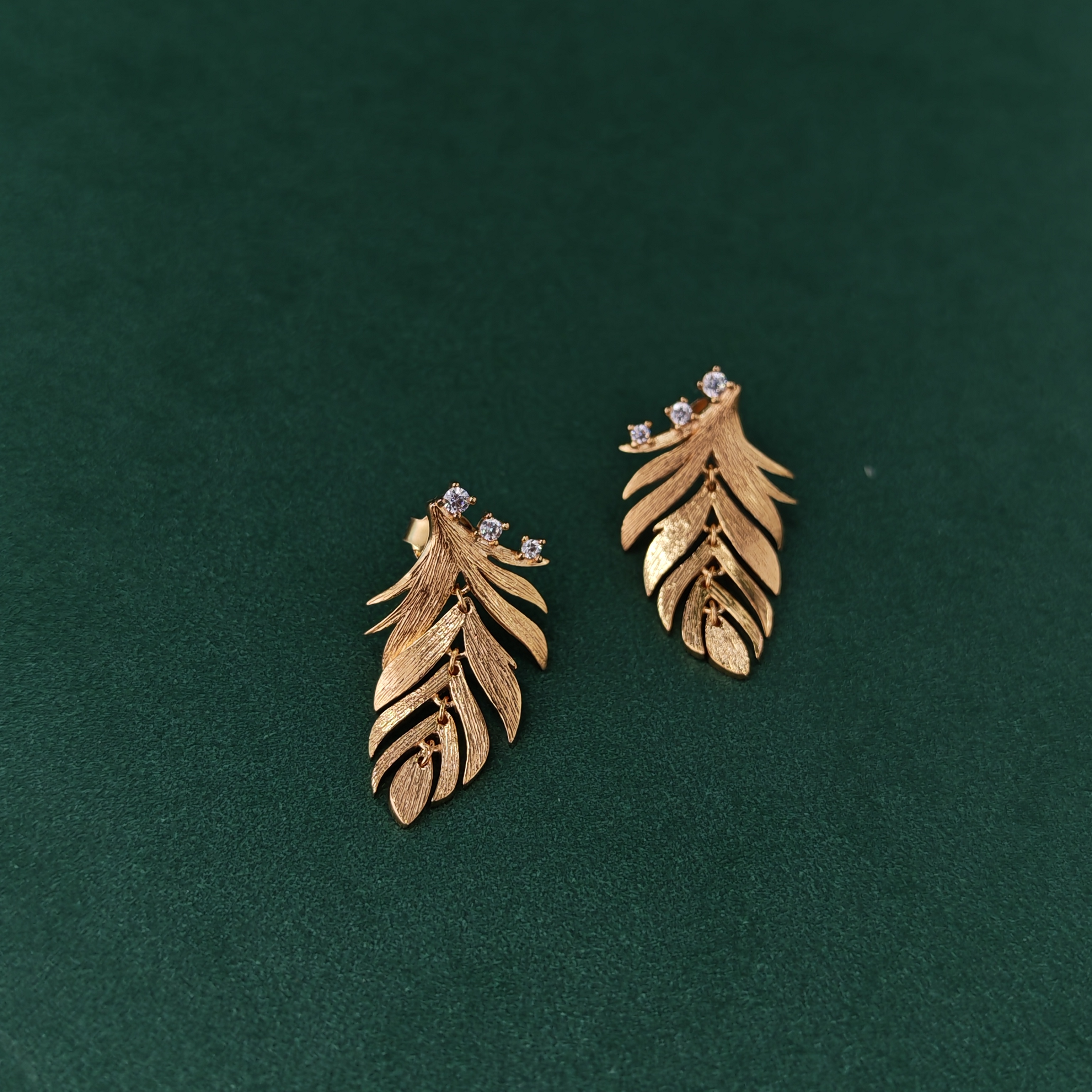 APOTIE's brushed feather with zirconium stud earrings and ear bone stud fashion S925 silver earrings, a niche design of stud accessories undefined