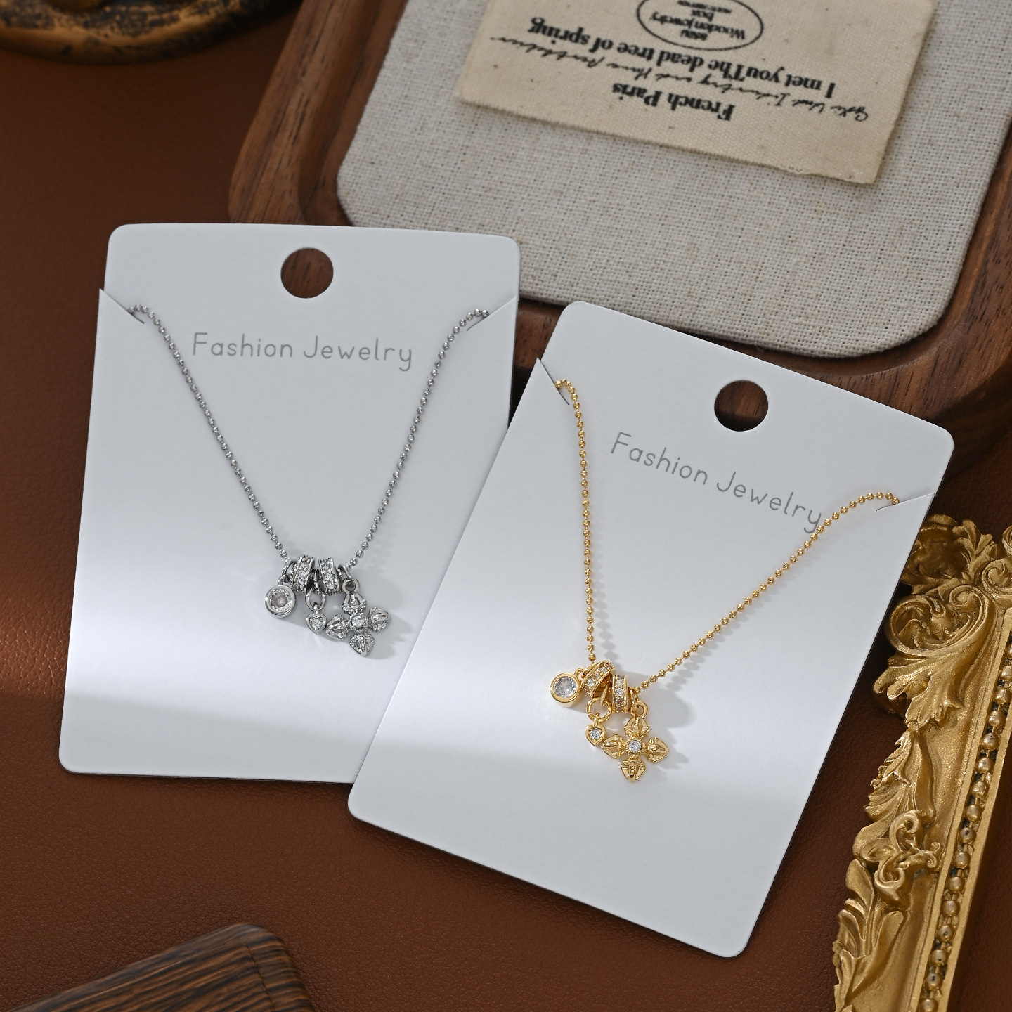 Gold multi-pendant necklace for women with small stone rings and cross-shaped flower tags, collarbone chain, retro decorative necklace