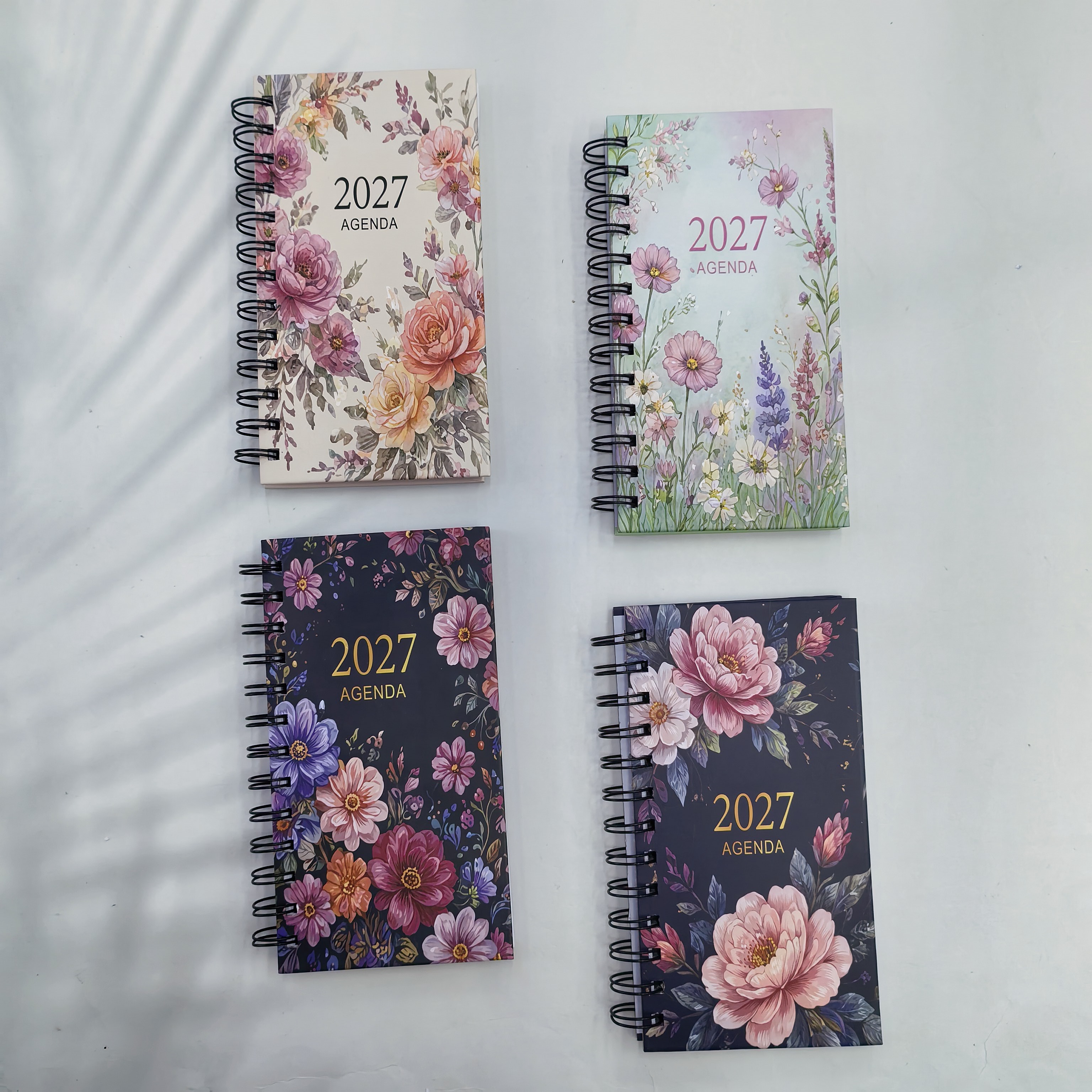 2027 Weekly calendar in English, multiple series, four pictures mixed, A5/48K annual calendar, this schedule, this French, Portuguese, Spanish, and Arabic supports customization Application Scenario