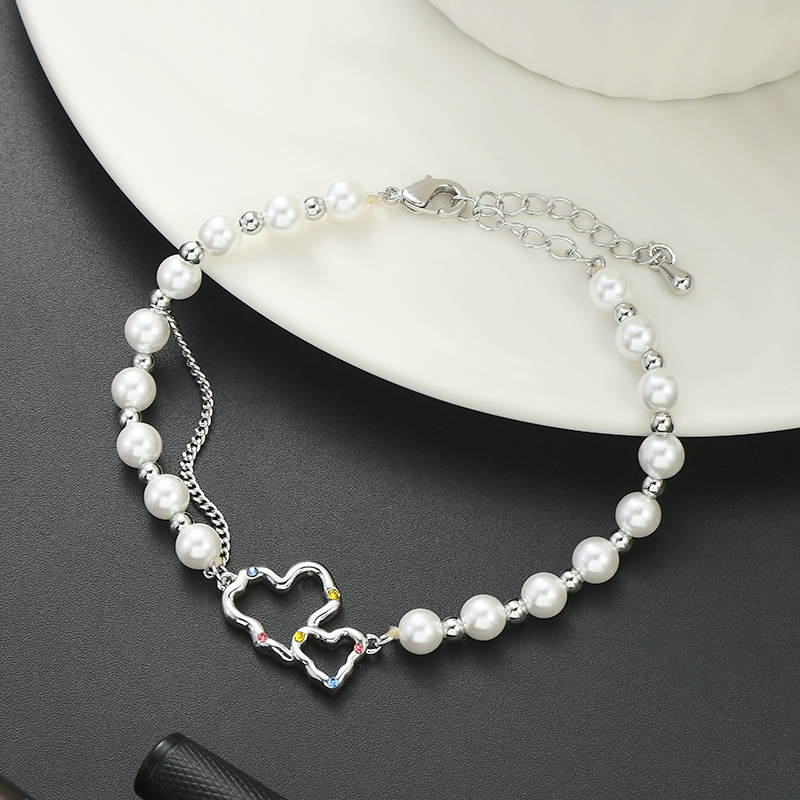 High-end, gentle and luxurious round bead bracelet with hollowed-out heart splicing, adjustable and versatile style Item Picture