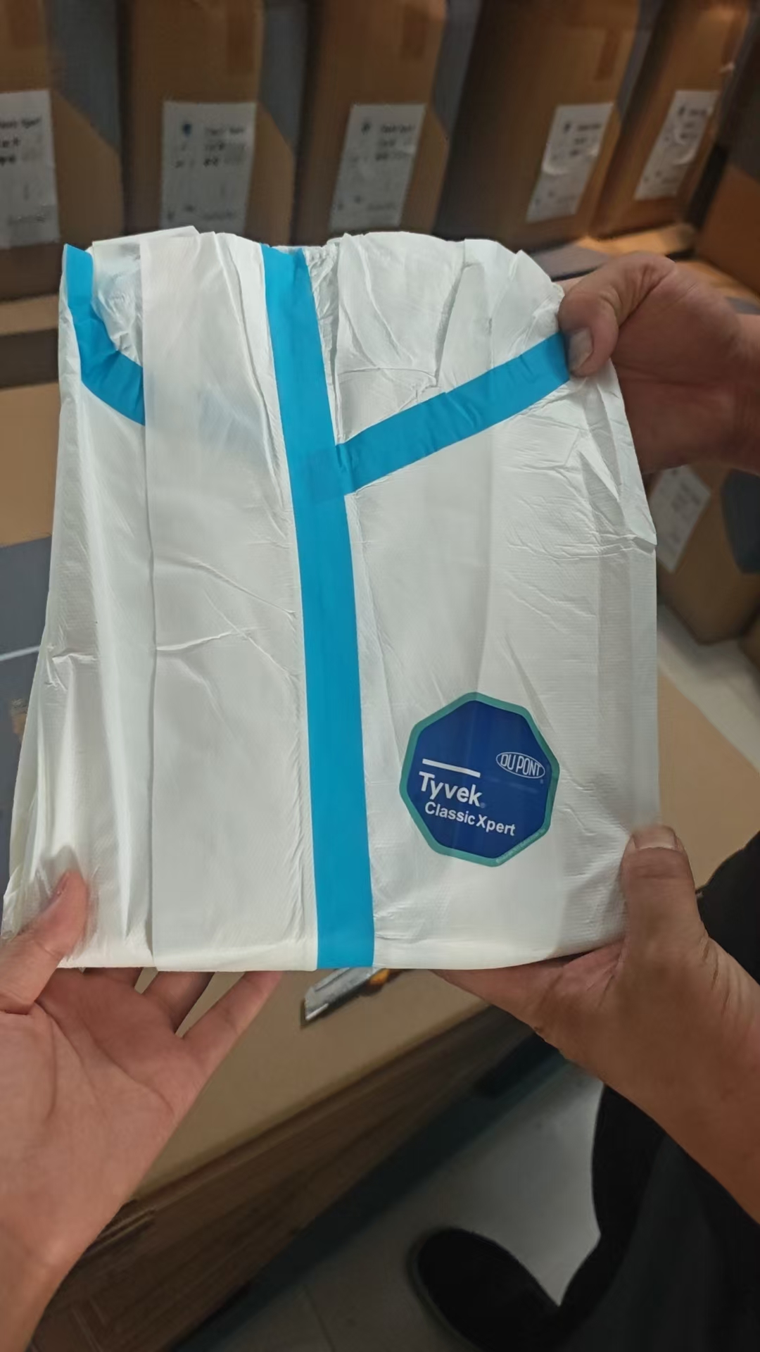 Ropa protectora médica bata blanca bolsa de embalaje azul ropa protectora polvo y bacterias equipo de protección médica ropa protectora médica bata blanca bata blanca médica Application Scenario