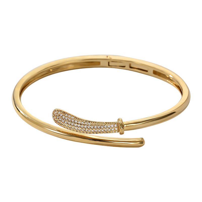 A golden staggered and interlaced open bracelet for women with partial diamond inlays, a light luxury, niche and versatile bracelet pic 7