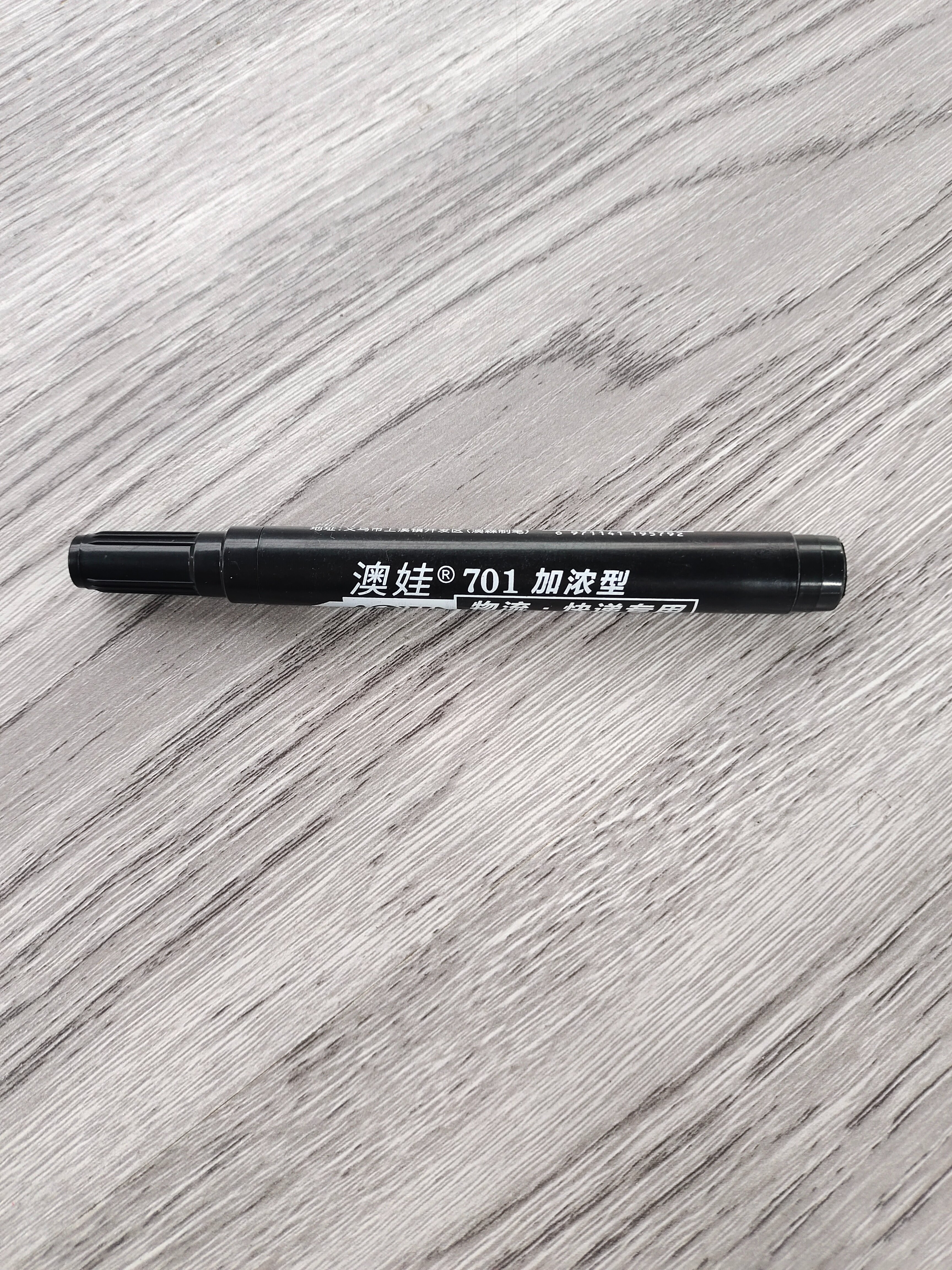 Black oil-based pen