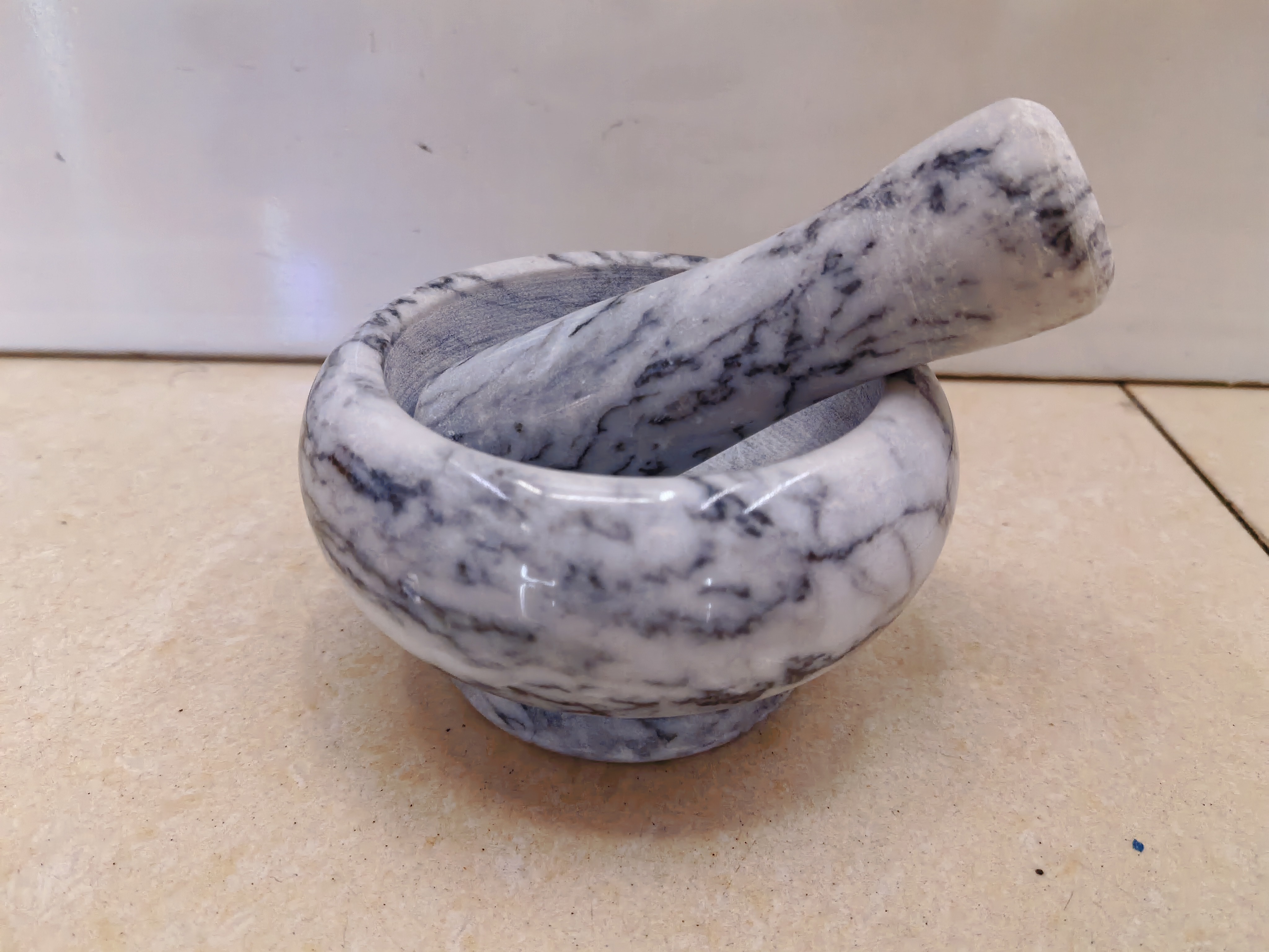Kitchen utensils: garlic mortar, stone mortar, garlic tamper full image