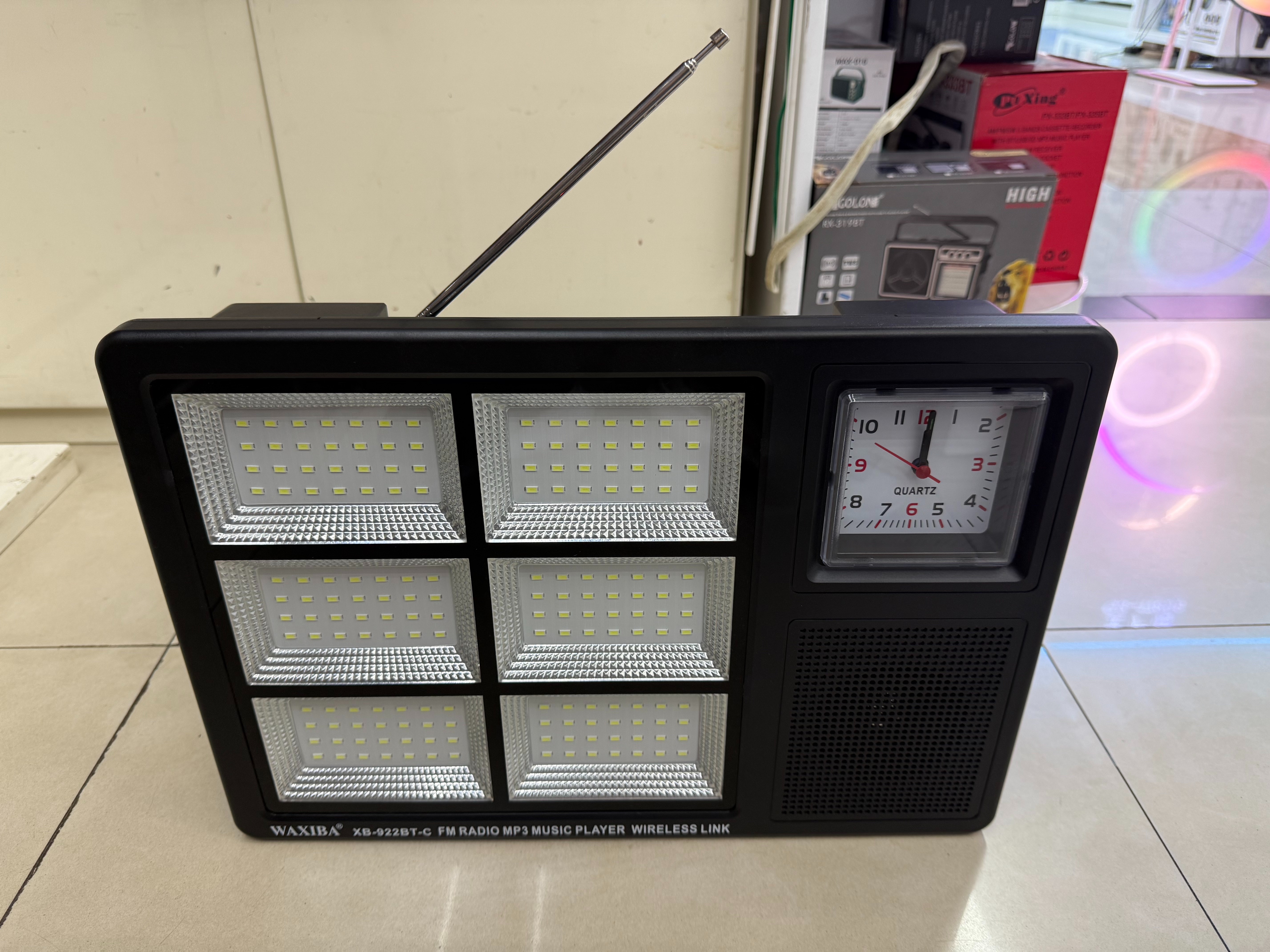 The XB-922BT-C solar panel radio with a light can be used for illumination in the wild, camping, outdoor equipment, emergency disaster relief, FM Bluetooth speaker, USBTF card for playing music, and can be discharged externally. It is a multi-functional photovoltaic panel details Picture