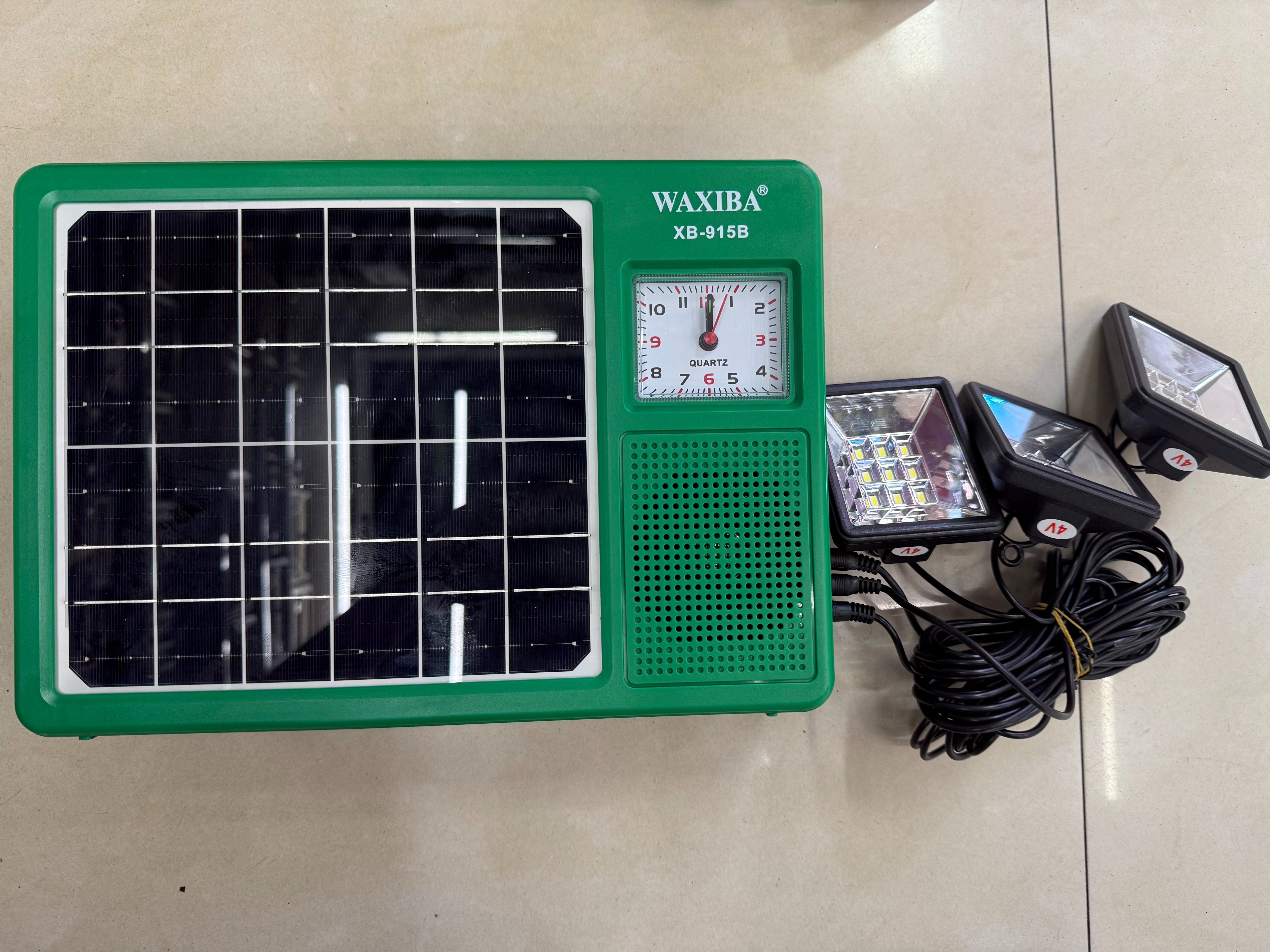 The XB-915B solar panel radio with a clock and light can be used for lighting in the wild, camping, outdoor equipment, emergency disaster relief, FM Bluetooth speaker, USBTF card to play music, and can be discharged externally. It is a multi-functional photovoltaic panel