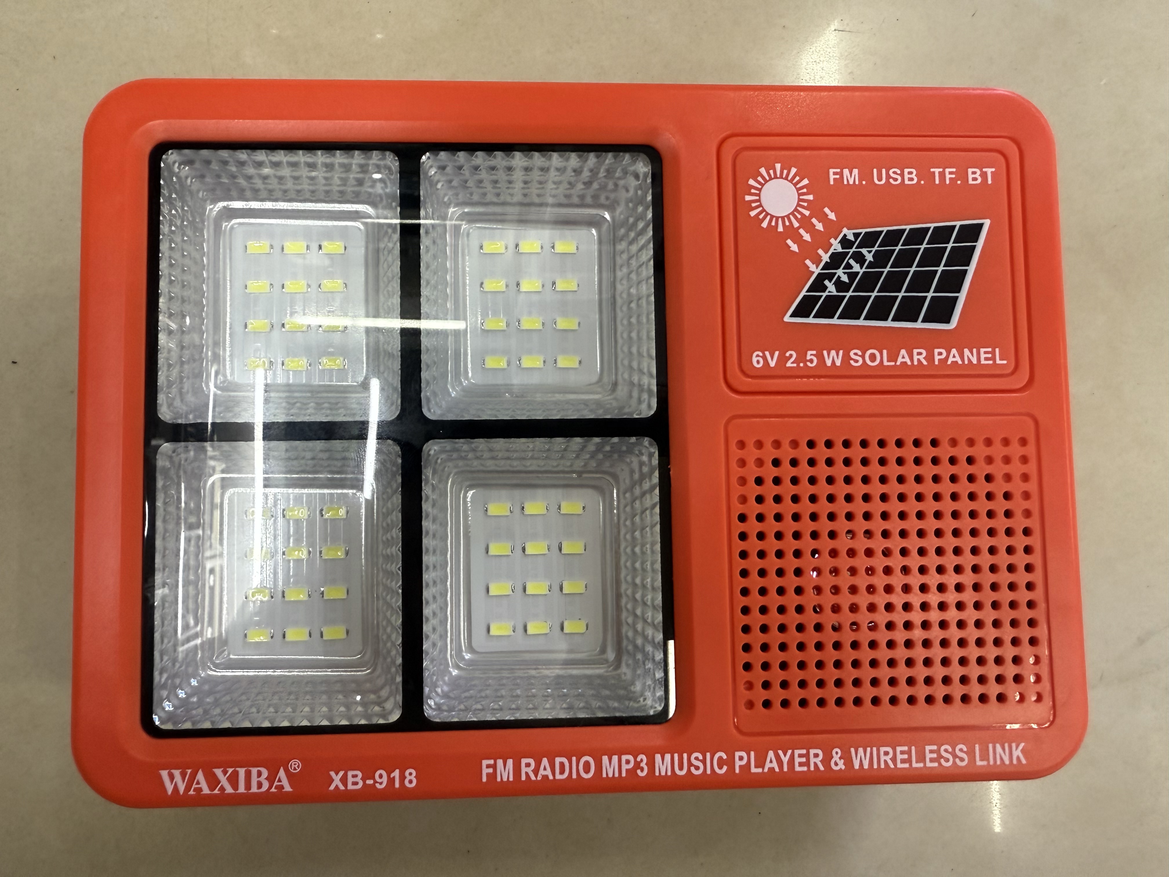 The XB-918 solar panel radio with a light can be used for illumination in the wild, camping, outdoor equipment, emergency disaster relief, FM Bluetooth speaker, USBTF card to play music, external power supply, and multi-functional photovoltaic panel