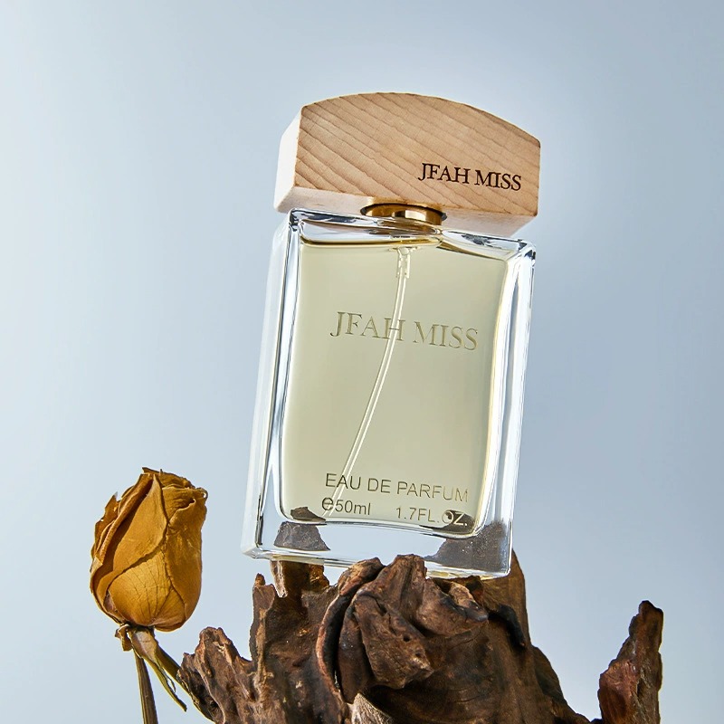 A transparent glass perfume bottle with a wooden cap, decorated on a dead wood, is a shell Jesus mural hanging art decoration Specification image