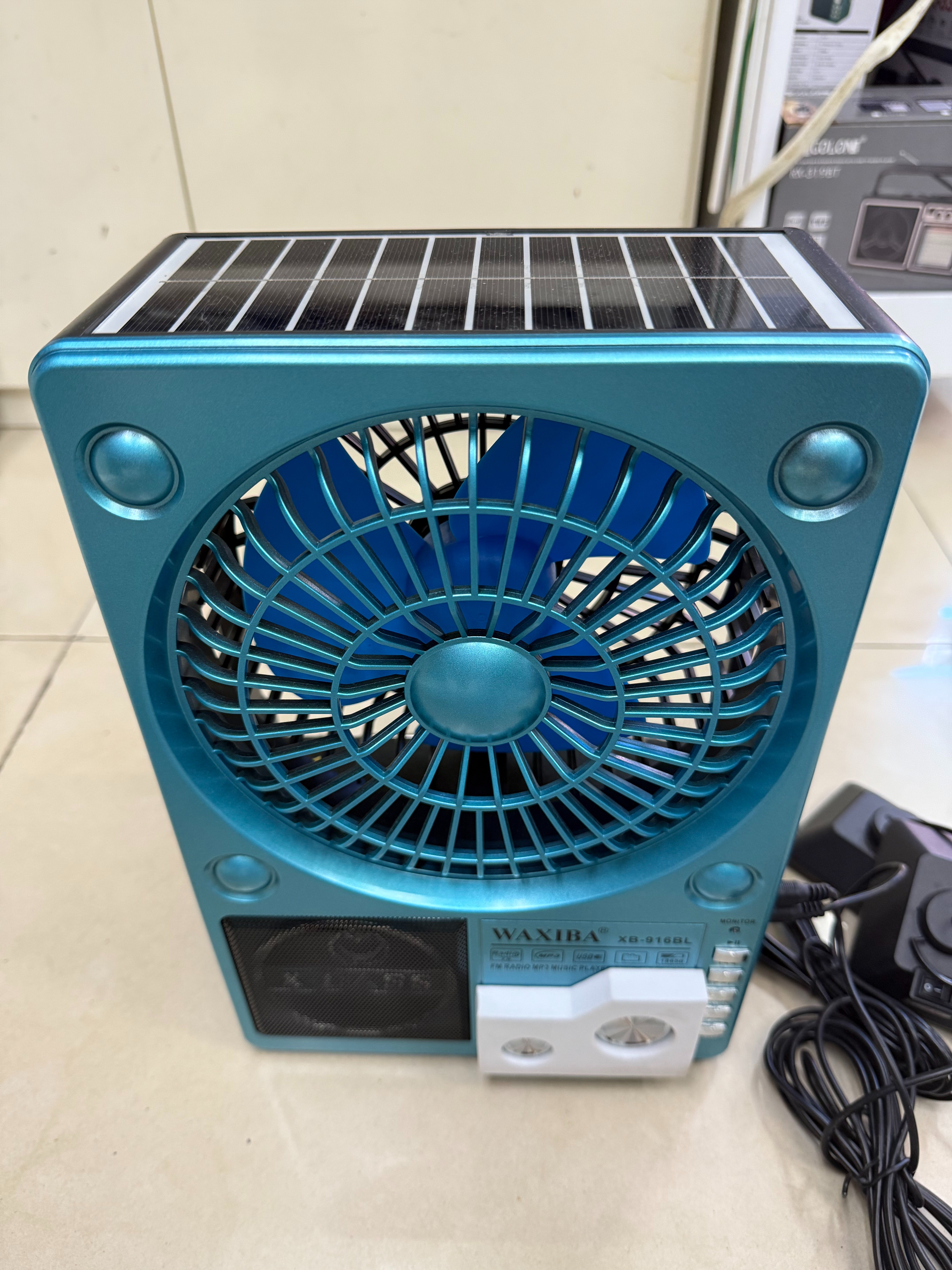 XB-916BL solar radio Bluetooth speaker with light illumination, multi-functional desktop ornament, USB music, TF card for playing music, for the elderly, solar panel for charging, discharging, cooling, heat dissipation and blowing details Picture