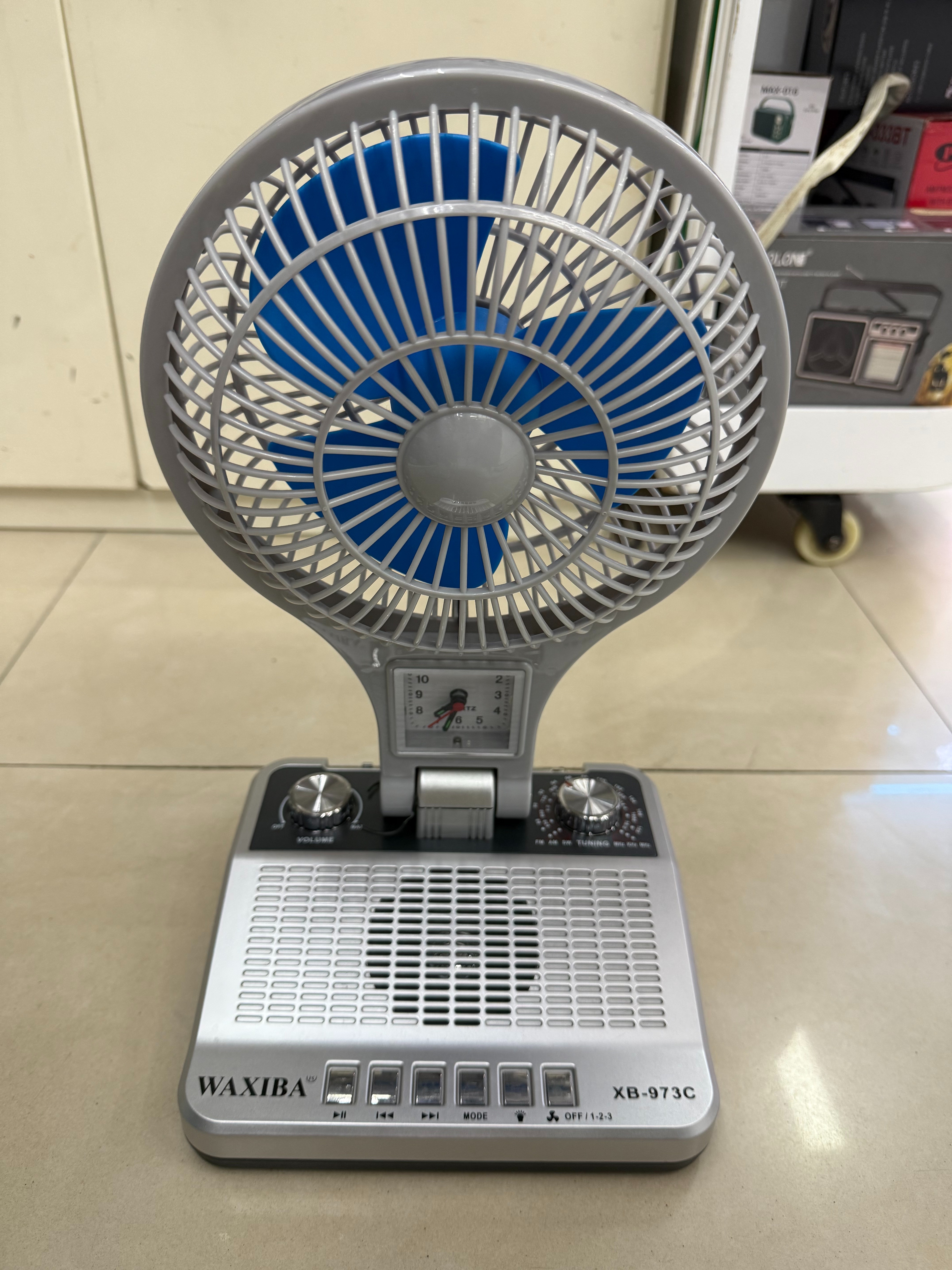 XB-973C multi-functional fan radio Bluetooth speaker with clock, multi-band, multi-functional desktop ornament, USB music, TF card for playing music, suitable for the elderly, charging, cooling, heat dissipation and blowing