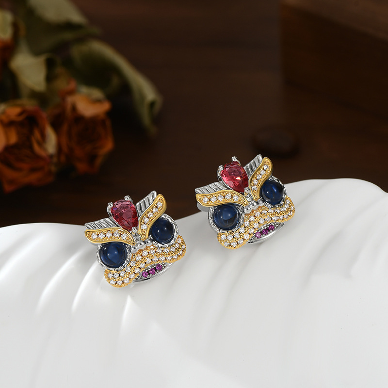 "National trend three-dimensional lion dance color gemstone contrasting color stud earrings for women, gold and silver color separation new Chinese-style niche individuality earrings. Specification image