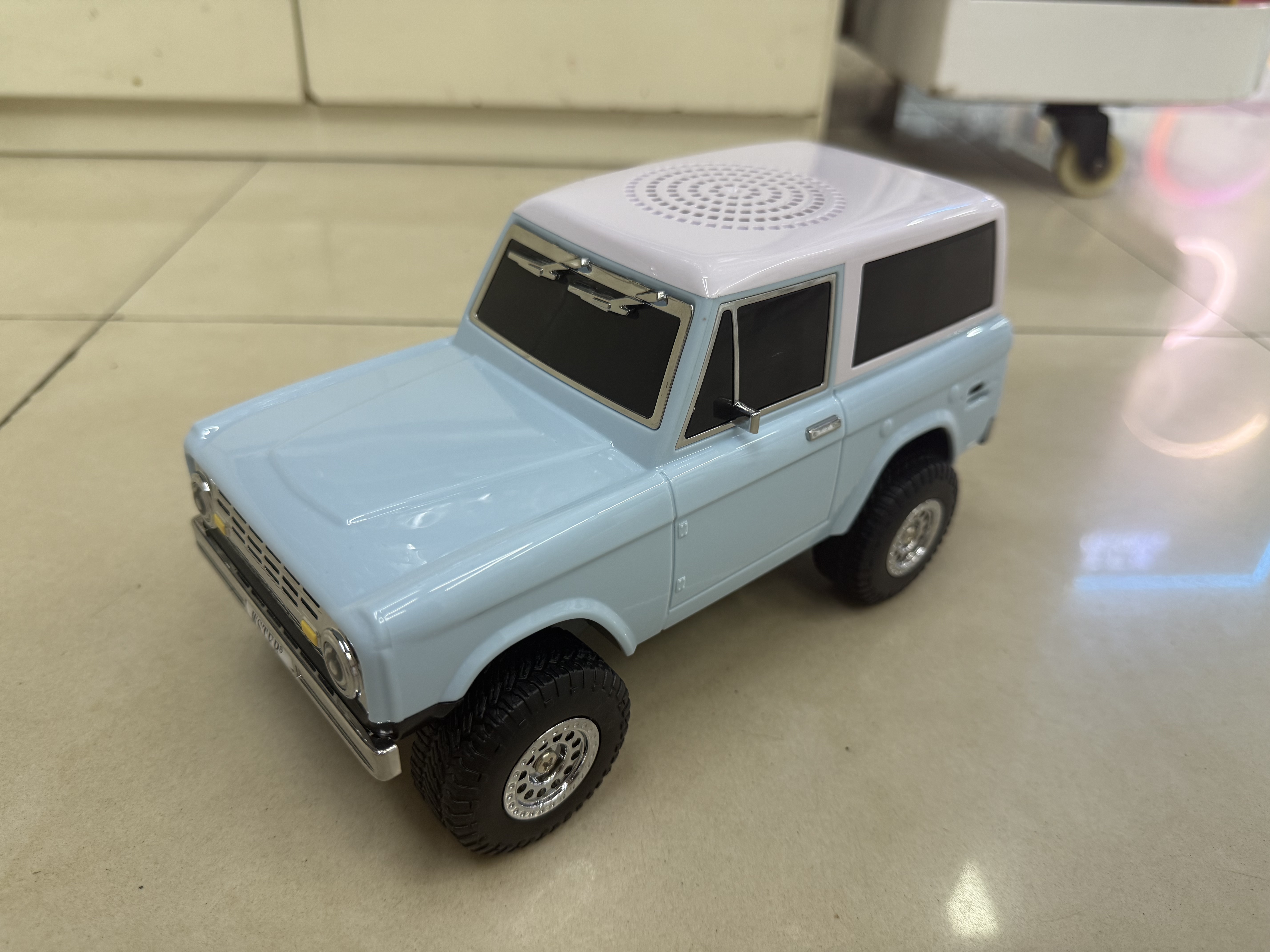 The new WS-750 Bluetooth speaker is in the shape of a car or an off-road vehicle. It features high-definition sound quality, a car speaker, a movable desktop ornament, a car ornament, USB music, a TF card for playing music, and is a great car accessory details Picture