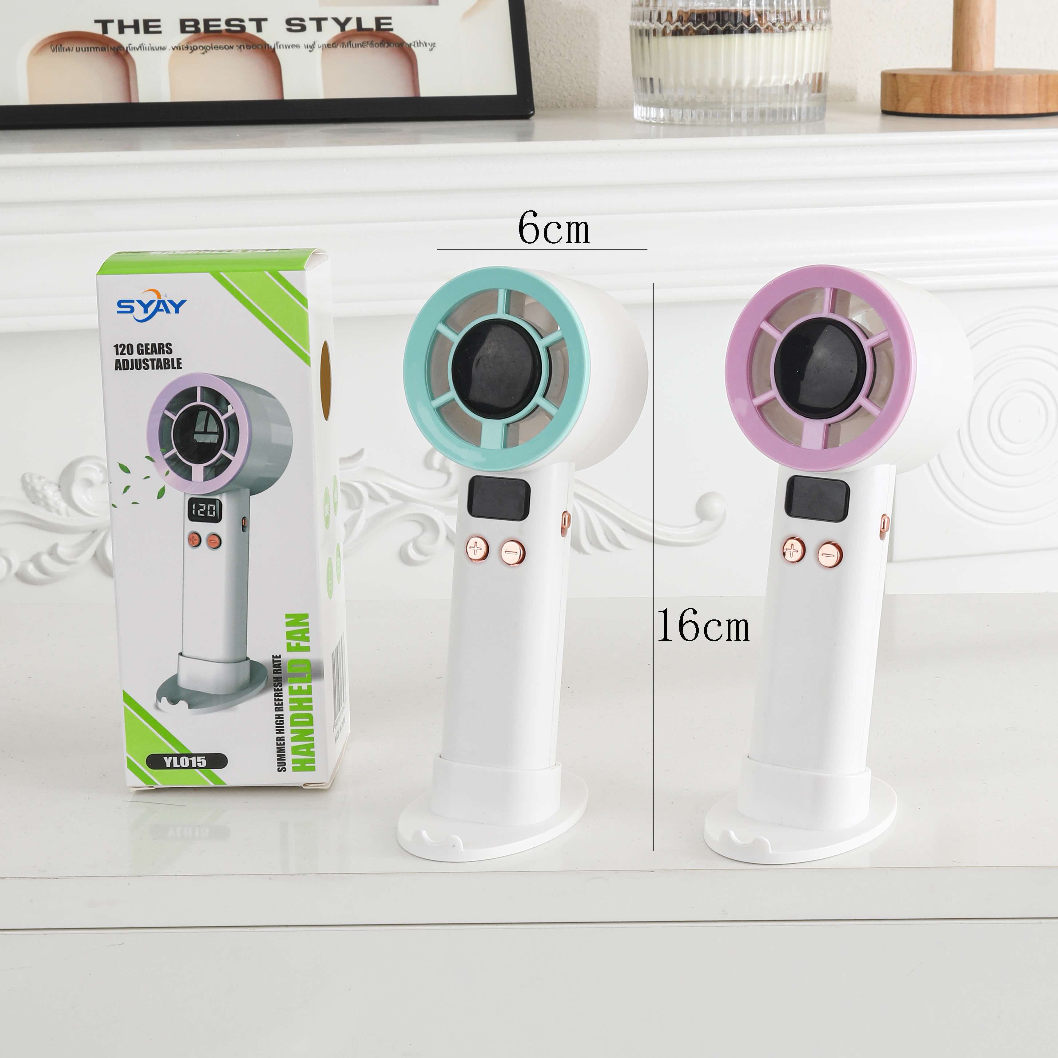 Handheld mini fan with a base and digital display
