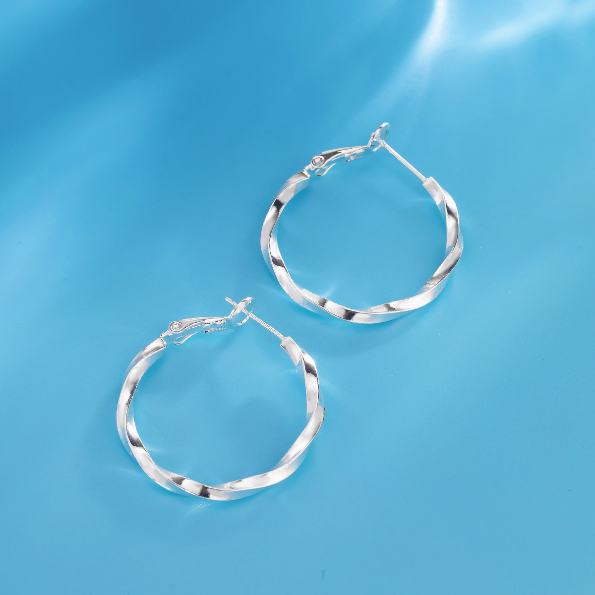Mobius twisted silver large ear rings Specification image