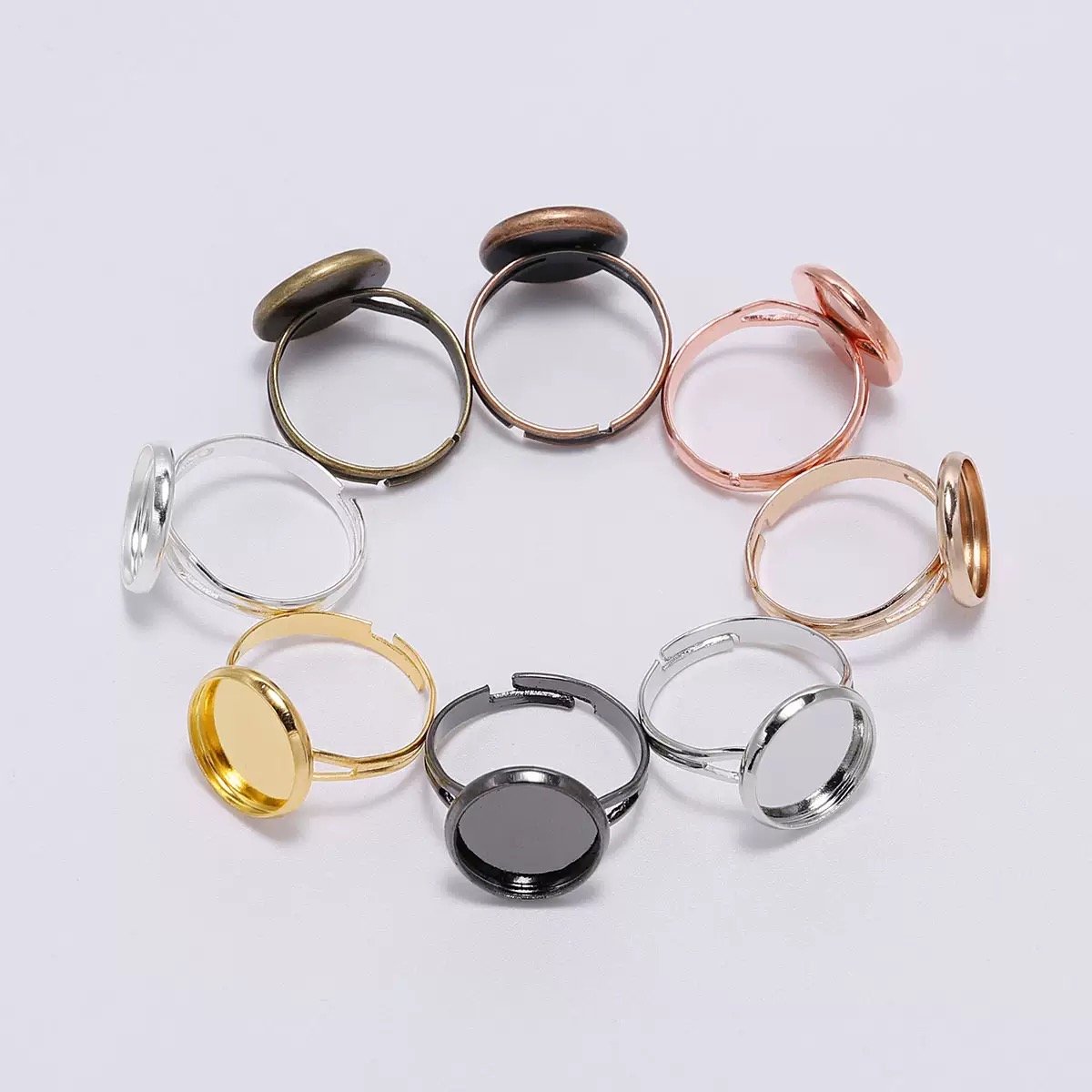 Dingxi jewelry accessories: Iron adjustable ring base, round ring setting, empty setting, glass veneer, resin oil drip jewelry accessories manufacturer wholesale