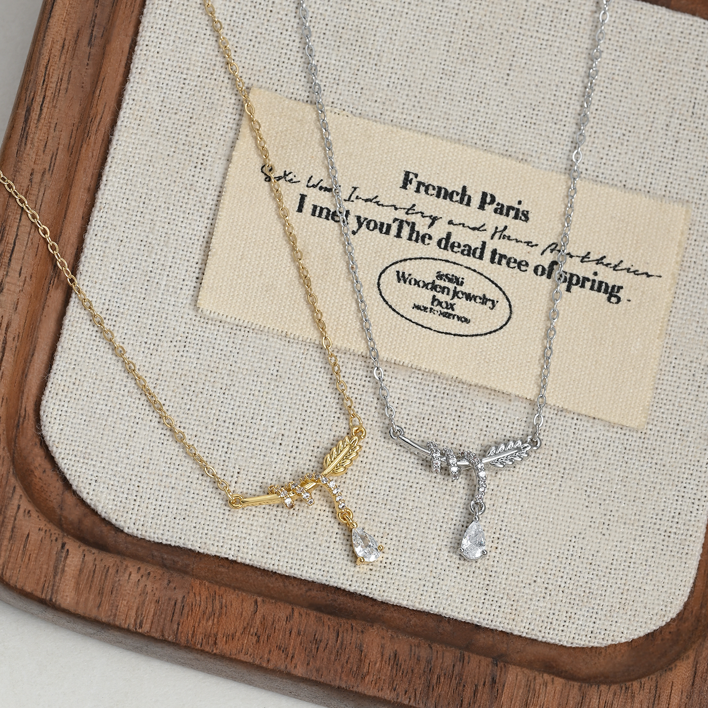 A niche wrapped feather necklace, a light luxury water drop collarbone chain, and a simple golden elegant necklace A niche wrapped feather necklace, a light luxury water drop collarbone chain, and a simple golden elegant necklace