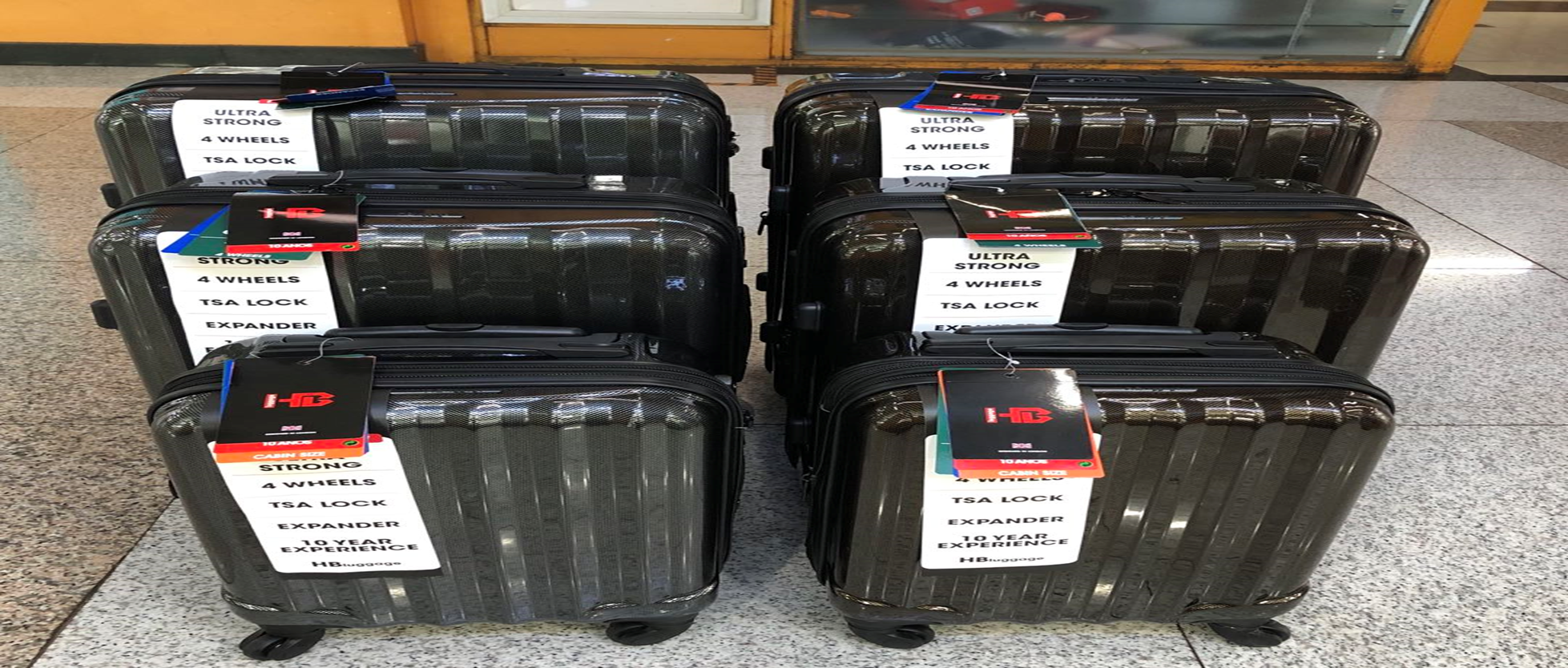 义乌好货 20寸新款PC耐摔耐砸海关锁可加宽大容量万向轮旅行拉杆箱详情图1