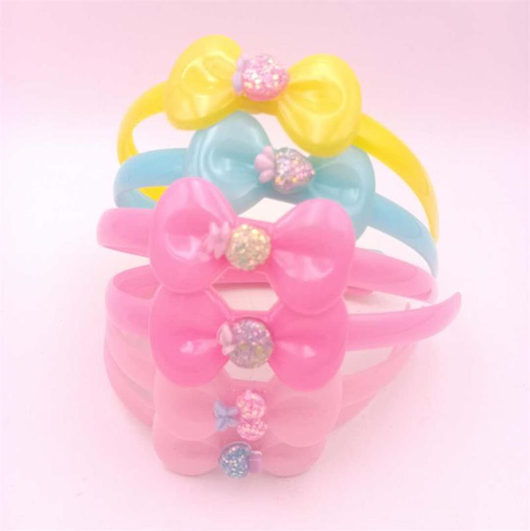 Yiwu quality children's headclips, hair bands and bow ties with cartoon stickers detail image 1