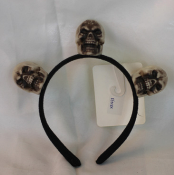 Three ghostly head buckles