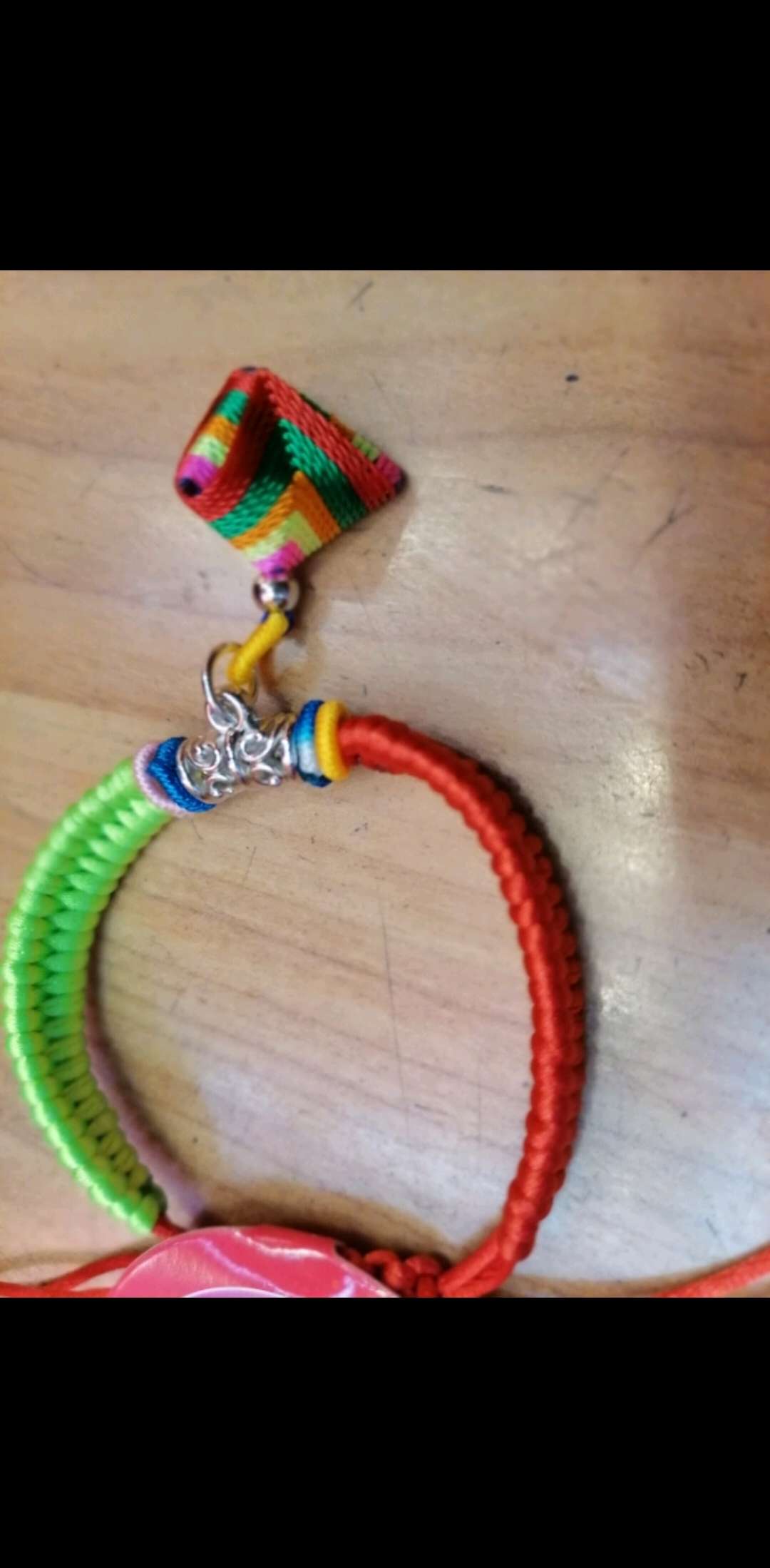 A two-color string bracelet for the Dragon Boat Festival is hung with a lucky ball of zongzi Item Picture