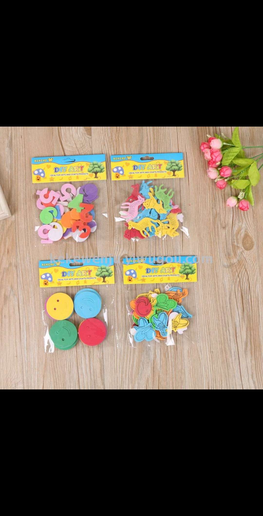 EVA wall stickers are used for the wall decoration of the kindergarten classroom environment, featuring digital animal smiling faces
