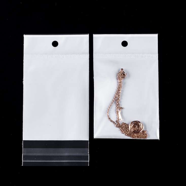 Factory stock of universal opp bags, self-adhesive white pearlescent film card head bags, transparent card head bags, colored card head round hole aircraft jewelry packaging bags, transparent plastic bags, hanging card bags, 1000 pieces per bundle detail image 4
