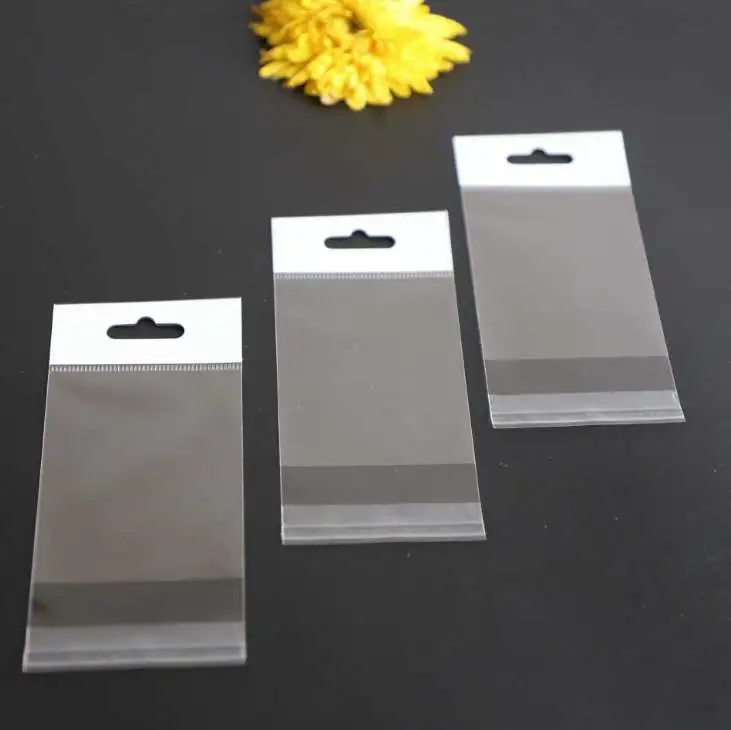 Factory stock of universal opp bags, self-adhesive white pearlescent film card head bags, transparent card head bags, colored card head round hole aircraft jewelry packaging bags, transparent plastic bags, hanging card bags, 1000 pieces per bundle detail image 2