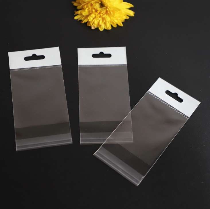 Factory stock of universal opp bags, self-adhesive white pearlescent film card head bags, transparent card head bags, colored card head round hole aircraft jewelry packaging bags, transparent plastic bags, hanging card bags, 1000 pieces per bundle detail image 7
