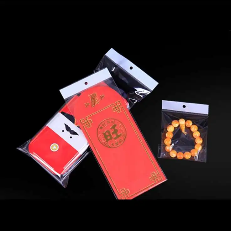 Factory stock of universal opp bags, self-adhesive white pearlescent film card head bags, transparent card head bags, colored card head round hole aircraft jewelry packaging bags, transparent plastic bags, hanging card bags, 1000 pieces per bundle detail image 1